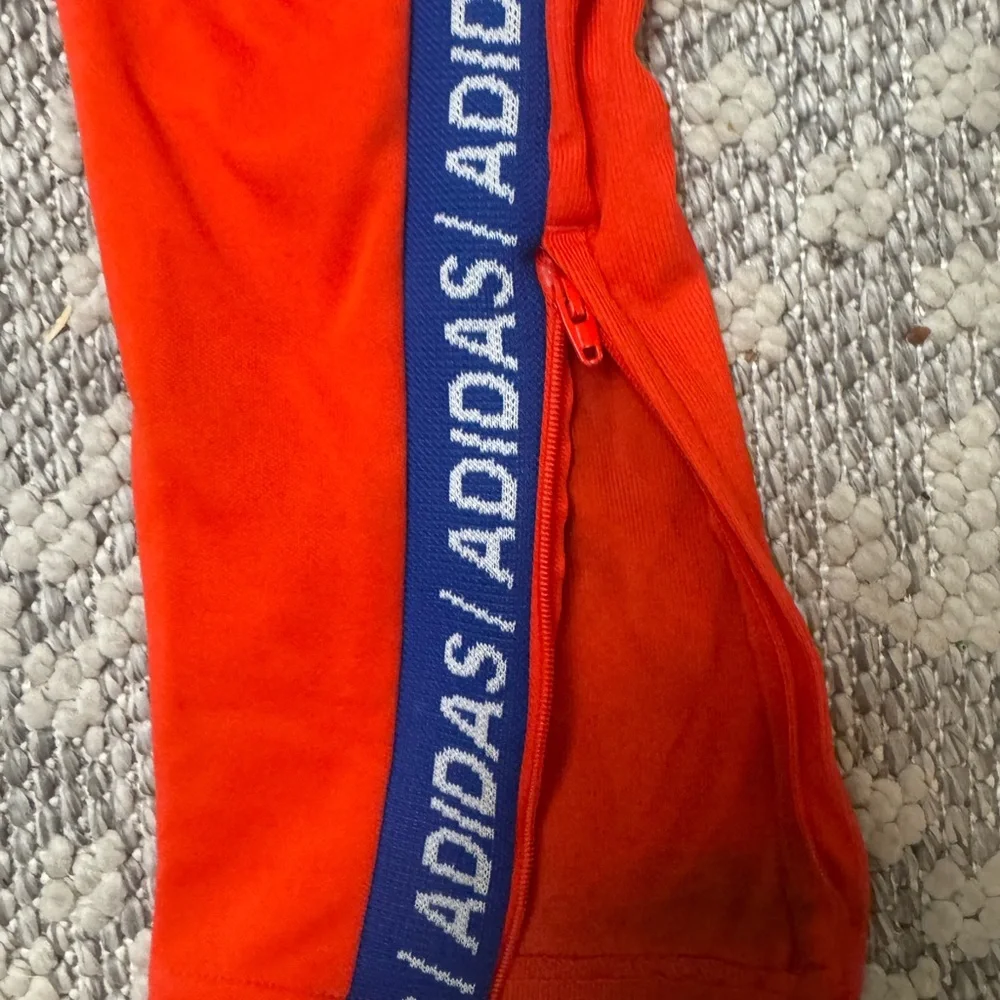 Adidas Kids' Red Joggers with Blue Accents